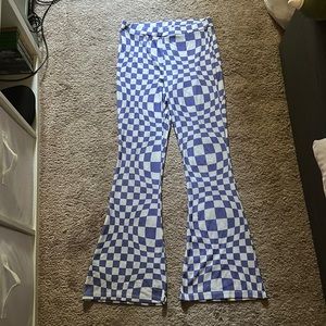 Zumiez wavy checkered purple and white flared leggings, size 12